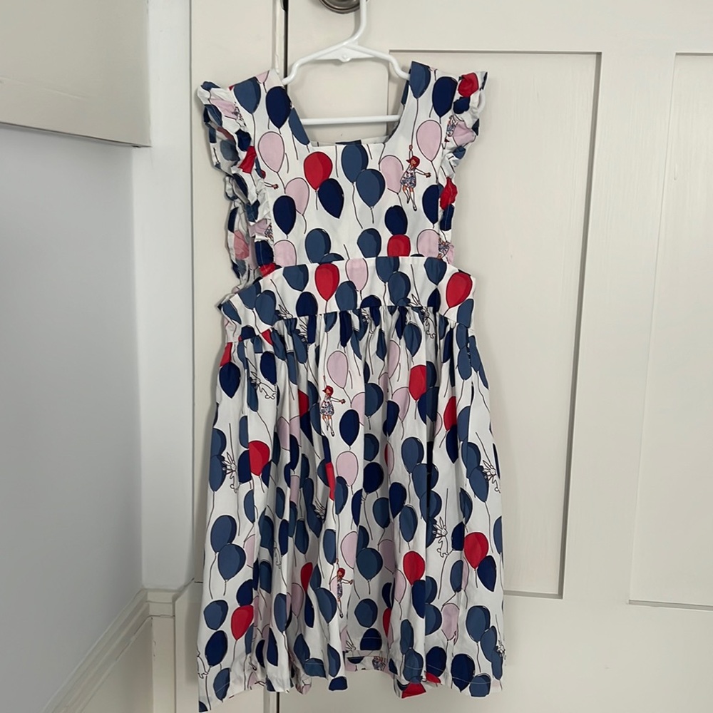 Petit peony party dress with blue and red balloons and Madeline / bunnies